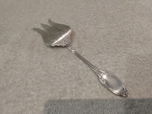 Fourchette servir le - à,