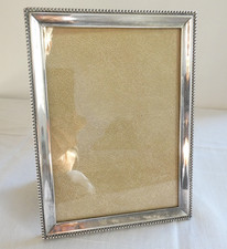 Elegant cadre photo métal argenté poinçon XIXe siècle rang de perles 19,5x14,5cm