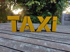 Logo TAXI (film)