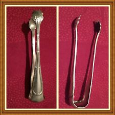 JOLIE PINCE A SUCRE EN METAL ARGENTE POINCONNEE ART DECO