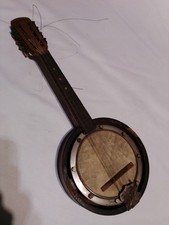 Banjo Magali en bois à 8 cordes ,  à rénover 