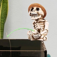 Statue de squelette de pêche