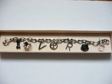 Bracelet VIKTOR & ROLF Flowerbomb Métal argenté Vintage.