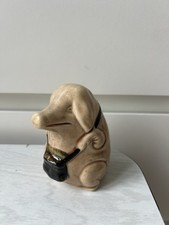 Ancienne tirelire à casser en barbotine cochon avec sacoche Made in France