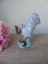 Figurine coq en poterie