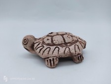 Tortue musicale en terre cuite