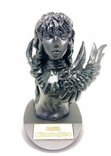 * Figurine en céramique
