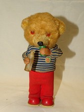 -OURS AUTOMATE PELUCHE QUI