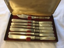 Antique silver butter knives