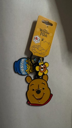 Disney winnie the pooh holding - the,