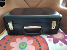 petite valise Noire Et Dorée