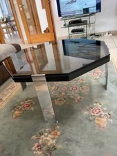 Belle table basse de salon, octogonale, en verre fumé