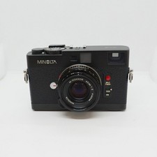 Minolta CLE Avec Objectif
