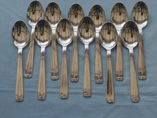 Lot de 12 cuillères à café Art Déco en métal argenté. DIXI.