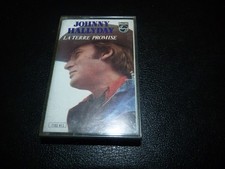 K7 CASSETTE AUDIO "JOHNNY HALLYDAY : LA TERRE PROMISE"