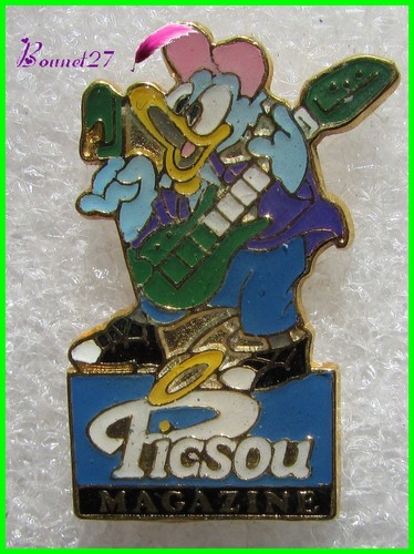 Pin donald avec une guitare - pin's,