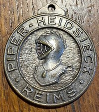 MÉDAILLE OU PORTE CLEFS