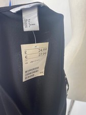 Pull noir à manches volantes