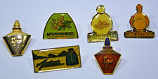5 Pin's + 1 broche 8ème jour parfum YVES ROCHER