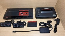 LIRE INFO- Lot Console Sega