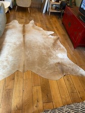 Tapis peau de vache marron clair