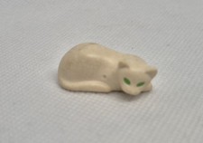 1 CHAT BLANC AUX YEUX VERTS