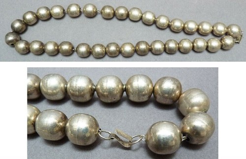Collier grosses perles - de,