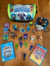 Pack SKYLANDERS de 2 jeux (SuperChargers + Trapteam), 2 plateaux, 13 figurines..