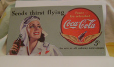 Plaque publicitaire en métal