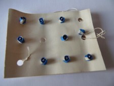 1 ROSETTE SUR FIL NICHAN EL