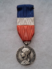 Une médaille du