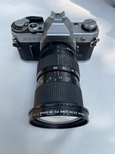 Canon AE-1 + Zoom 35-105 +