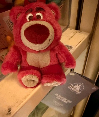 Peluche qui tient sur - qui,