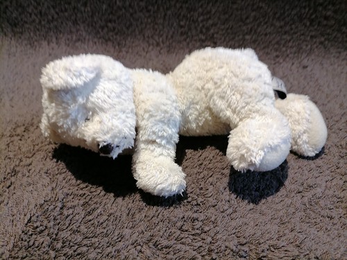 Doudou peluche chien couché