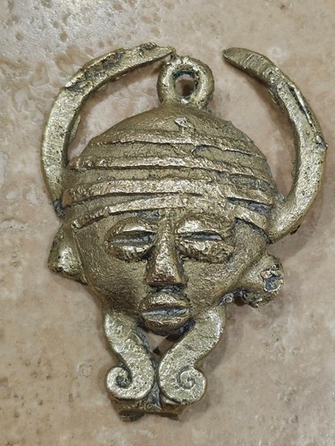 Pendentif masque africain