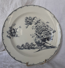 Grand plat rond en faïence de