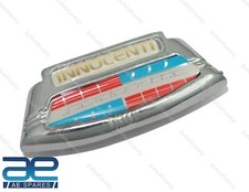 Badge Innocenti moulé en