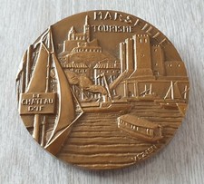 MEDAILLE EN BRONZE / ART /