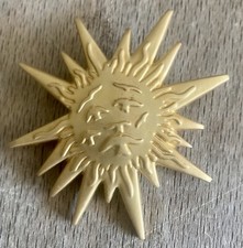 broche Elsa Schiaparelli Dali parfum le Roy Soleil vintage couture