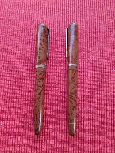 Stylos plume or - 2,