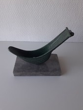 Chistera en regule sur Marbre