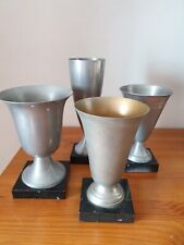 Quatre coupes sportives anciennes de chez Bouillot & Co Paris