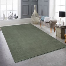 Tapis à poils longs dans un vert foncé profond - luxe et bien-&eci