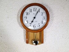 Pendule murale Hanson vintage avec balancier