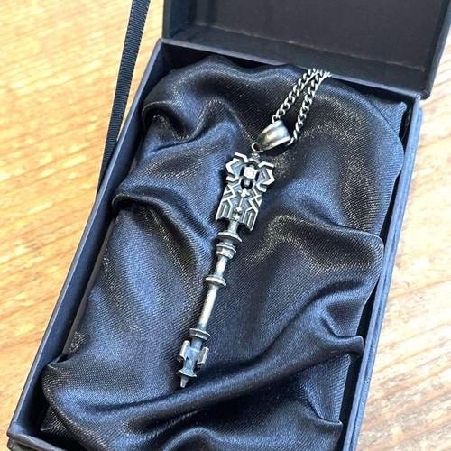 Collier pendentif canne