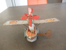 retro-vintage - jouet avion mécanique en tole fonctionne avec la clef