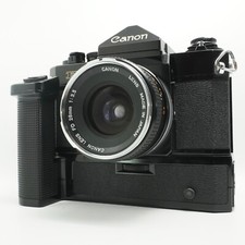 Appareil photo reflex argentique 35 mm Canon F-1 premier modèle + objectif FD...