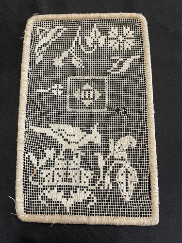 Broderie sur filet