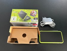 Console New Nintendo 2DS XL Noir et citron vert dans sa boite d'origine