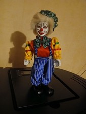 Clown automate musicale en céramique 35 cm de haut en très bon état.